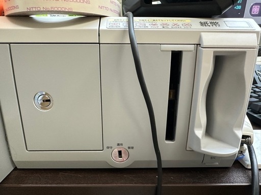 自動釣銭機「RT-200」「RAD-200」