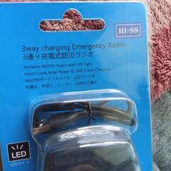 懐中電気付きトランジスターラジオの画像