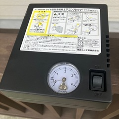 軽自動車電動コンプレッサー付きパンク修理キットの画像