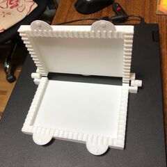 ブラジル料理のパステルを作るときに使う押し型です。の画像