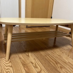 【お取引先決まりました】折りたたみテーブル だ円 棚付きの画像