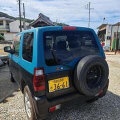 平成20年パジェロミニてす。ターボ車、少し左側が凹凸があります。令和7年3月まで、車検がございます。今も調子がよく走っています。あくまでも中古車なのでノークレムノーリターンでお願いします。名義変更までの預り金三万円を預からせて頂きます。名義変更完了後速やかに返金いたします。の画像