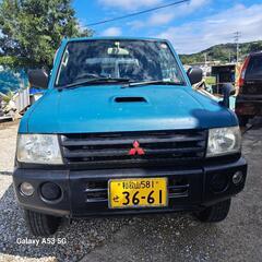 平成20年パジェロミニてす。ターボ車、少し左側が凹凸があります。...