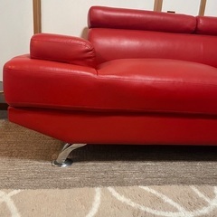 A modern and stylish large sofa of almost a new type.