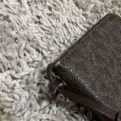 マイケルコース 手帳型携帯ケースの画像