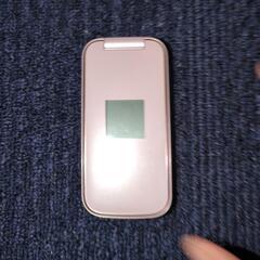 携帯電話　らくらくフォン　DOCOMO　白ロムの画像