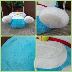★［F1784］〈中古品〉ドラえもん　ぬいぐるみ　寸法　幅(手の部分)約75㎝  高さ約70㎝  厚み約40㎝の画像