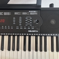 電子キーボード＆スタンドセットの画像