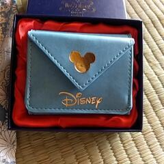 ディズニー小さな小銭入れと巾着未使用品の画像
