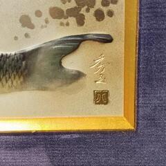 額入りの鯉のアートの画像