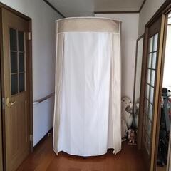 スチールパイプ製回転式衣料収納差し上げますの画像