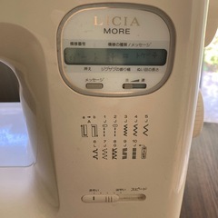 brotherミシン+アンティークミシン台付きの画像