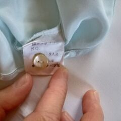 ミントブルーのきらきら光沢ブラウス  半袖の画像