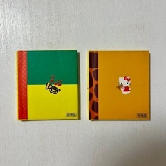 リラックマのペットボトルカバーとボトルオープナー&キティちゃんミニ本の画像