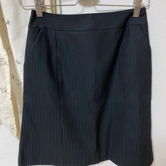 黒ストライプ　スーツの画像