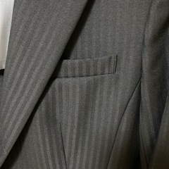 黒ストライプ　スーツの画像