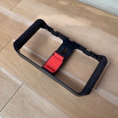 スマホホルダーと三脚のセットの画像