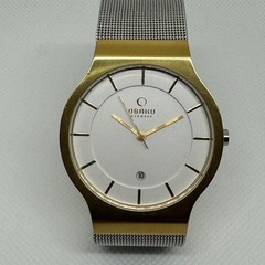 男女どちらでも【オシャレな北欧ブランド】⑦obaku  丸型　ゴールドの画像