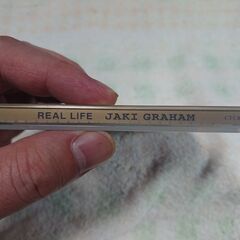 ♠　Real Life Jaki Graham (グラハム ジャッキー) 　８０年代を代表するＵＫソウル・シンガー、Ｊ･グラハムのフル・アルバム。ルーファスの名曲「ブレイキング・アウェイ」のセルフ・カヴァー等、どこを切ってもオシャレでクオリティの高いＵＫソウルが聴けるマスト・バイの一枚。の画像