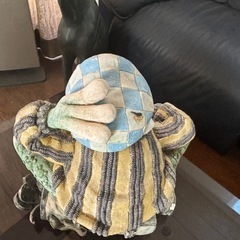 ゴルフの道具を持ったカエルのおじさんの画像