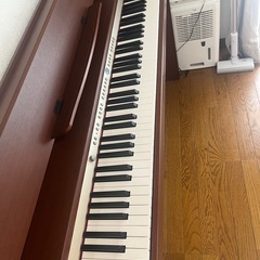 Roland 電子ピアノ　茶色木目調の画像