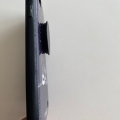 iPhoneスヌーピーカバーリング付きの画像