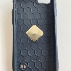iPhoneスヌーピーカバーリング付きの画像