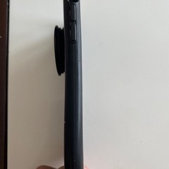 iPhoneスヌーピーカバーリング付きの画像