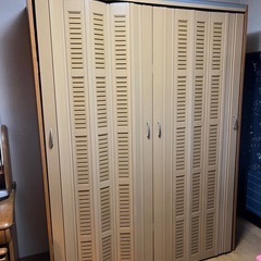 クローゼット　収納　アコーディオン扉付きの画像