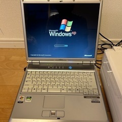 取引中　パソコンとプリンターの画像