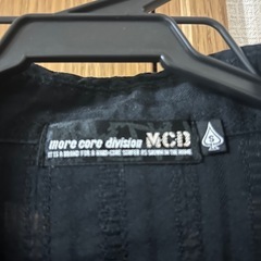 MCD BLACK刺繍7部袖シャツの画像