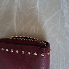 COACH　バーガンディースタッズ　長財布の画像