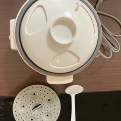 電気おかゆ鍋の画像