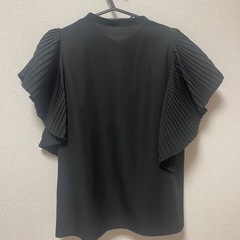 黒のブラウスの画像