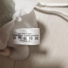 首からかけられる妖狐蔵馬のポーチの画像