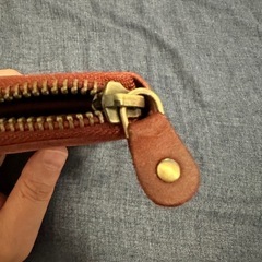ラウンド型ファスナー仕様財布の画像