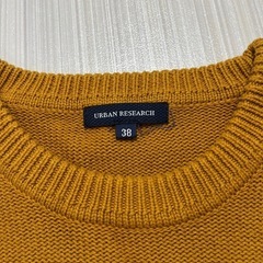 urban research ニットセーターの画像