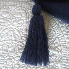 ビル・ブラス リバーシブル無地ニットマフラー タッセル付の画像