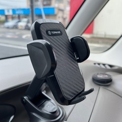 Topmake スマホホルダー 車 車載ホルダー ゲルサクションカップ/クリップ 2in1 携帯ホルダー 車 エアコン吹き出し口 360度回転 伸縮アーム 幅52mm〜95mmの携帯電話に適しています 日本語マニュアル付き（黒）
の画像