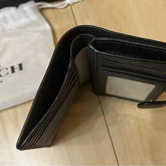二つ折り財布　coachの画像