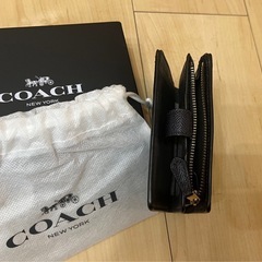 二つ折り財布　coachの画像