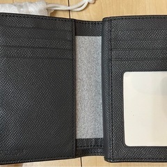 二つ折り財布　coachの画像
