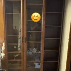 週末処分します！スライド式本棚 ガラス扉 可動式の画像