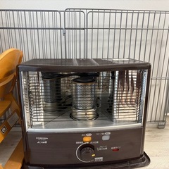 石油ストーブとゲージの画像