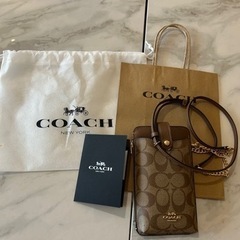 【新品未使用】COACH コーチ NORTH/SOUTH スマホ...