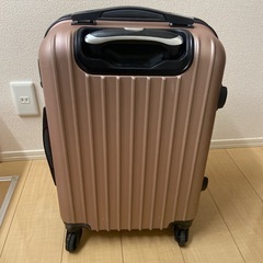 ピンク　キャリーバッグ　タイヤ破損
