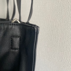 tk. TAKEO KIKUCHI  黒バッグの画像