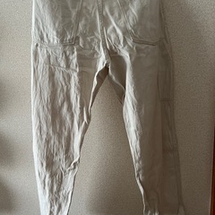 クリーム色 スリムフィット スラックスの画像