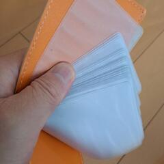 【中古】大量22枚収納カードケース　オレンジ　レザー風　　ニー 8の画像