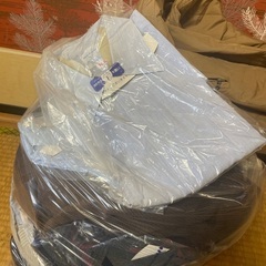 A bag full of men's clothes (shi...